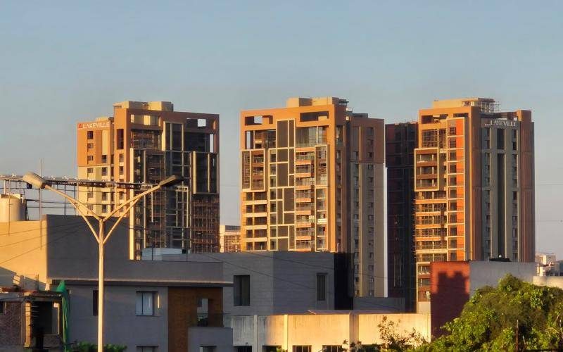 Modern apartment towers at sunset